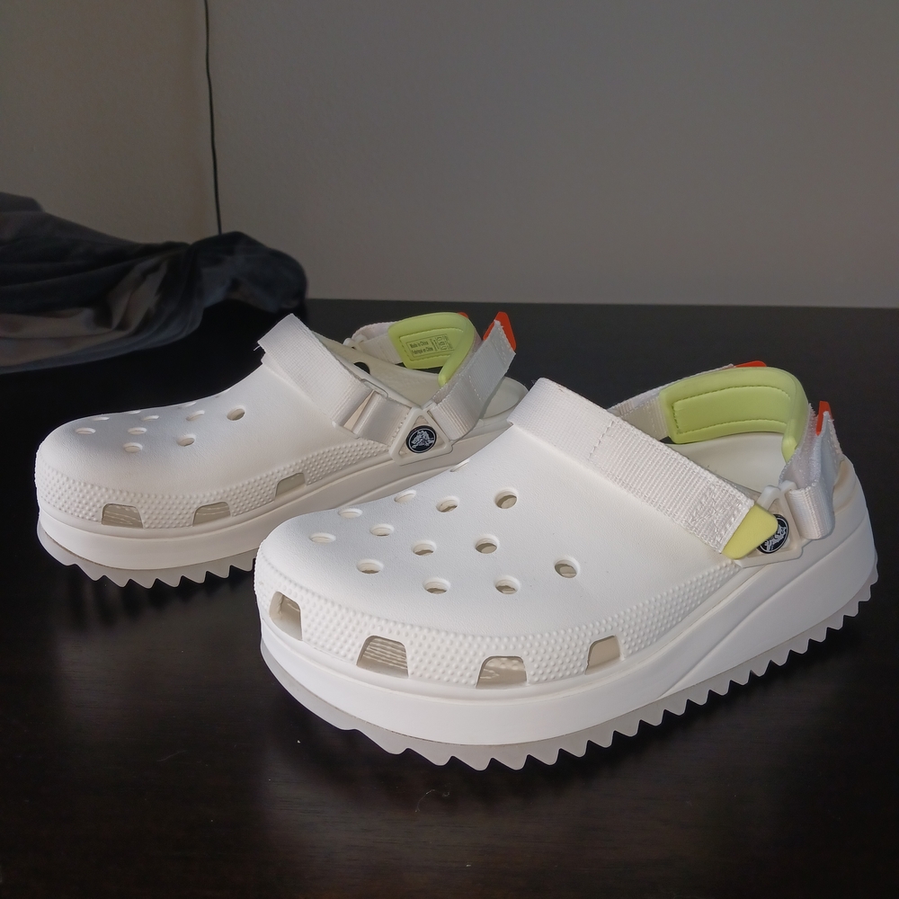 CROCS Unisex White With Neon Yellow And Orange Strap Accents.